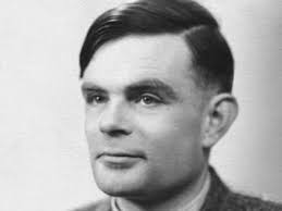 Black and white headshot photo of Alan Turing from a side on angle