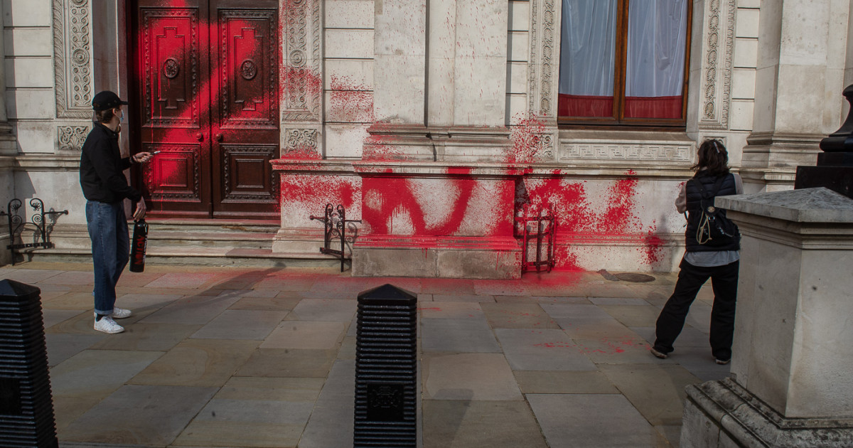 Palestine Action spray red paint on a Whitehall building.