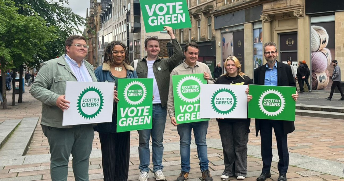 An image of the Glasgow Green General Election candidates on Buchanan Street. Left to right: Niall Christie, Iris Duane, Ewan Lewis, John Hamelink, Amy Kettyles, Nick Quail. Credit: Derek Watson.